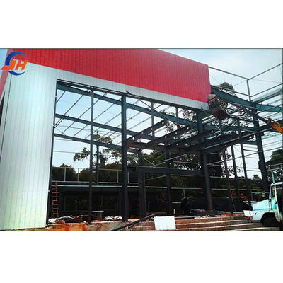 Fabricazione di edifici in acciaio Struttura in ferro rosso Piccola officina fabbrica con porta scorrevole